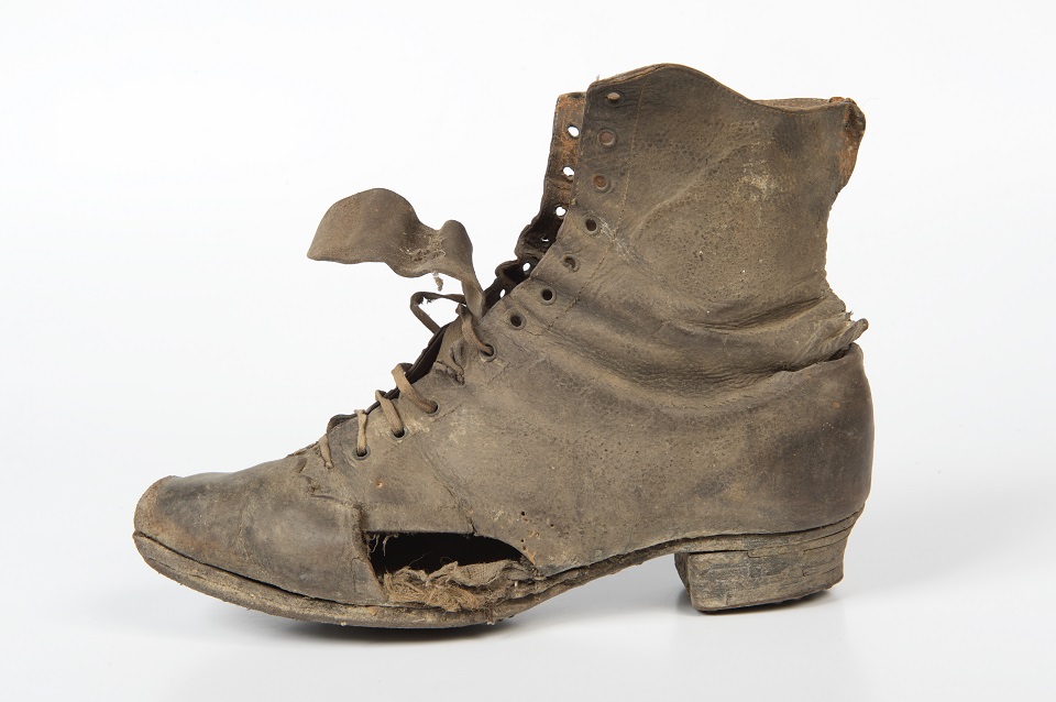 Women's black leather lace ankle boot, 1880s. Found under the bedroom floor of a farm in Shepton Mallet, Somerset