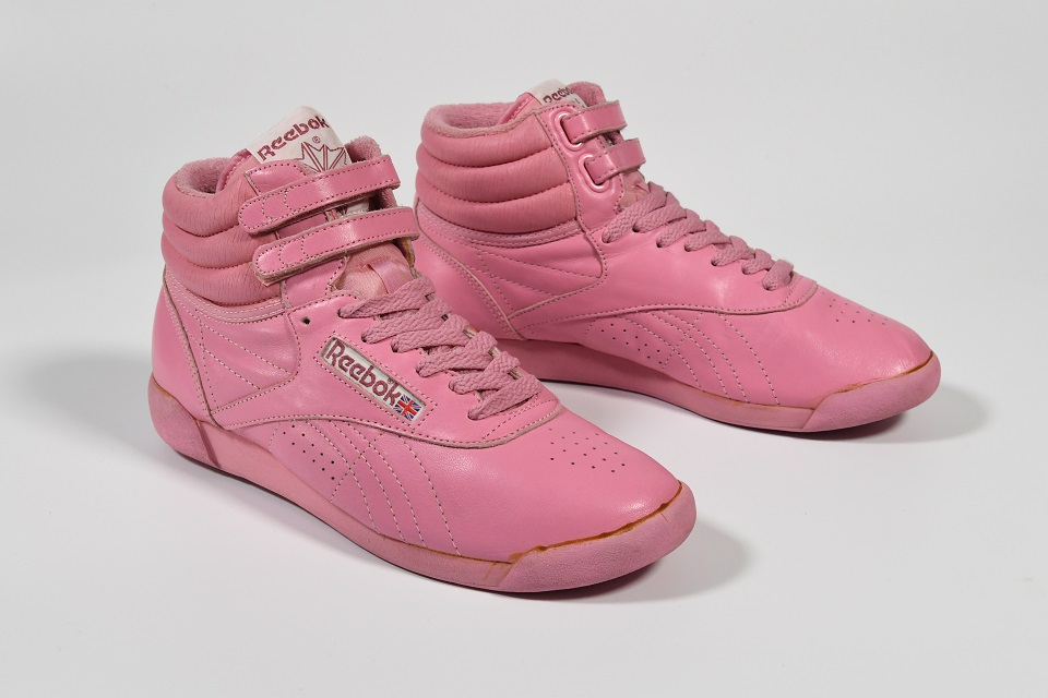 image link to Pink Reebok trainers page.
