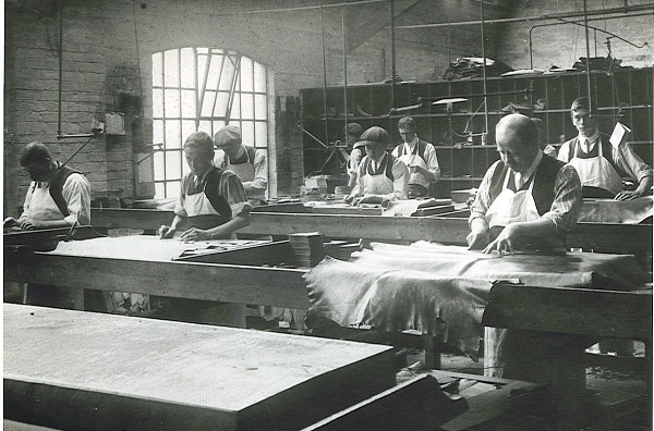Black and white photograph of the clicking Room, unknown shoe factory in Kettering, c.1900