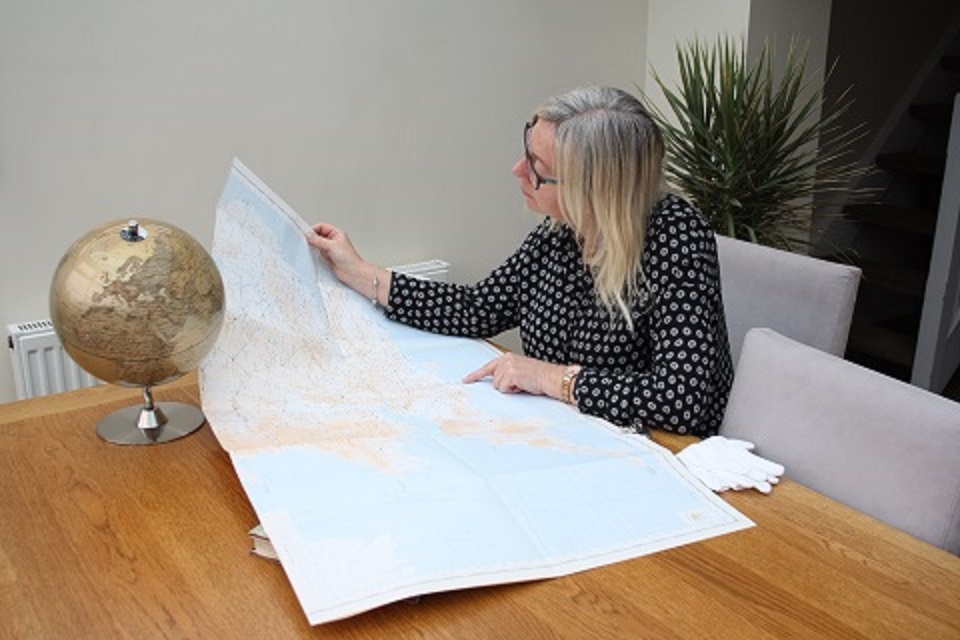 eacher looking at map of Roman Britain.