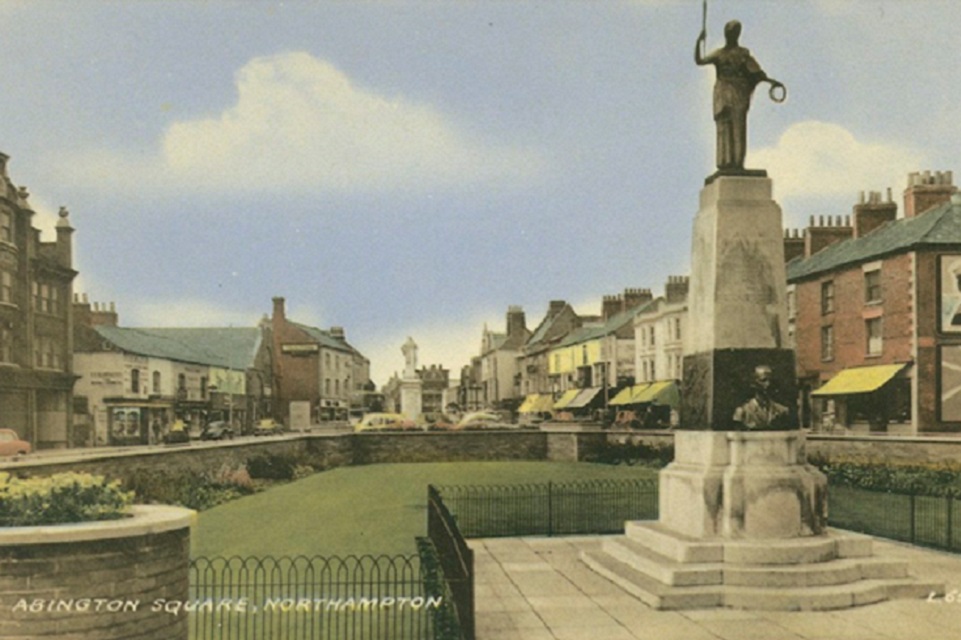 Abington Square Postcard, coloured postcard showing Abington Square with statue of Charkes Bradlaugh in the background.