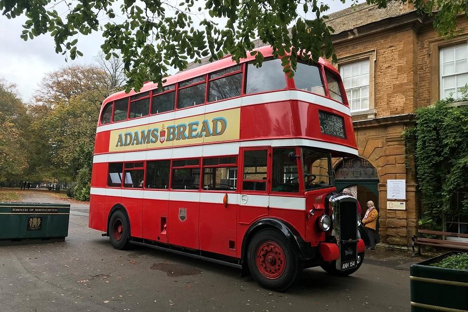 Photo of vintage bus outside Abington Park Museum