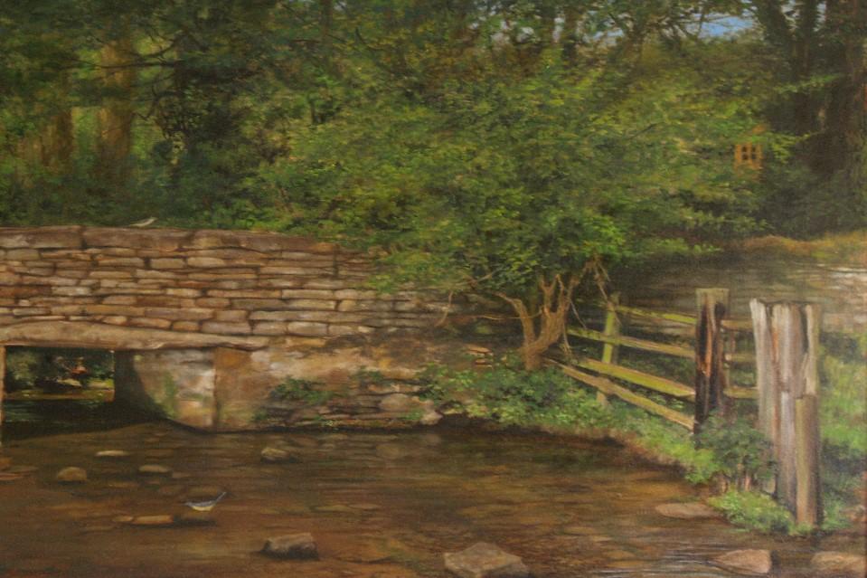 Painting showing ronded green tree to right of painting with bron stone bridge beneath. The foreground deoicts a brown river.