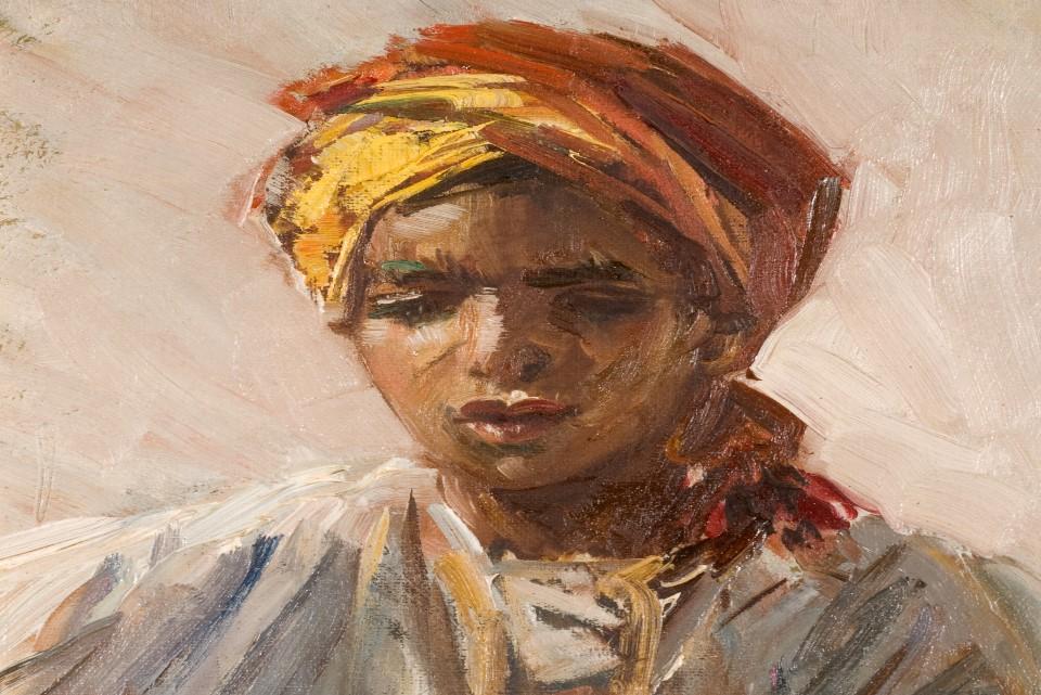 Colurful image of a portrait of a boy wearing a red turban