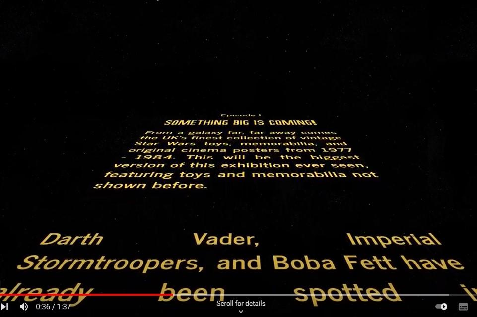 screenshot from youtube. Black screen with yellow writing anglig accross away from the viewer. Telling the story of the starwars exhibition