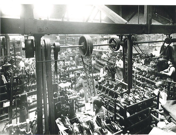 Black and white photograph of the making room at The Mounts shoe factory, Northampton, c.1900
