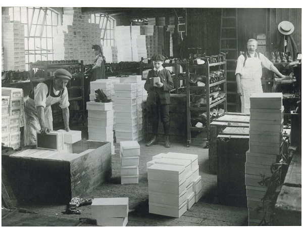 Black and white photograph of the packing room at an unknown shoe factory, Kettering c.1900